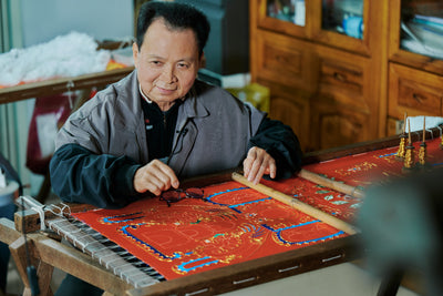 An Embroidery Master Who Works Methodically and Meticulously