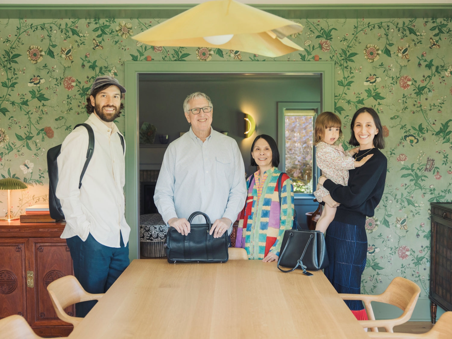 Three-generation family and their bags