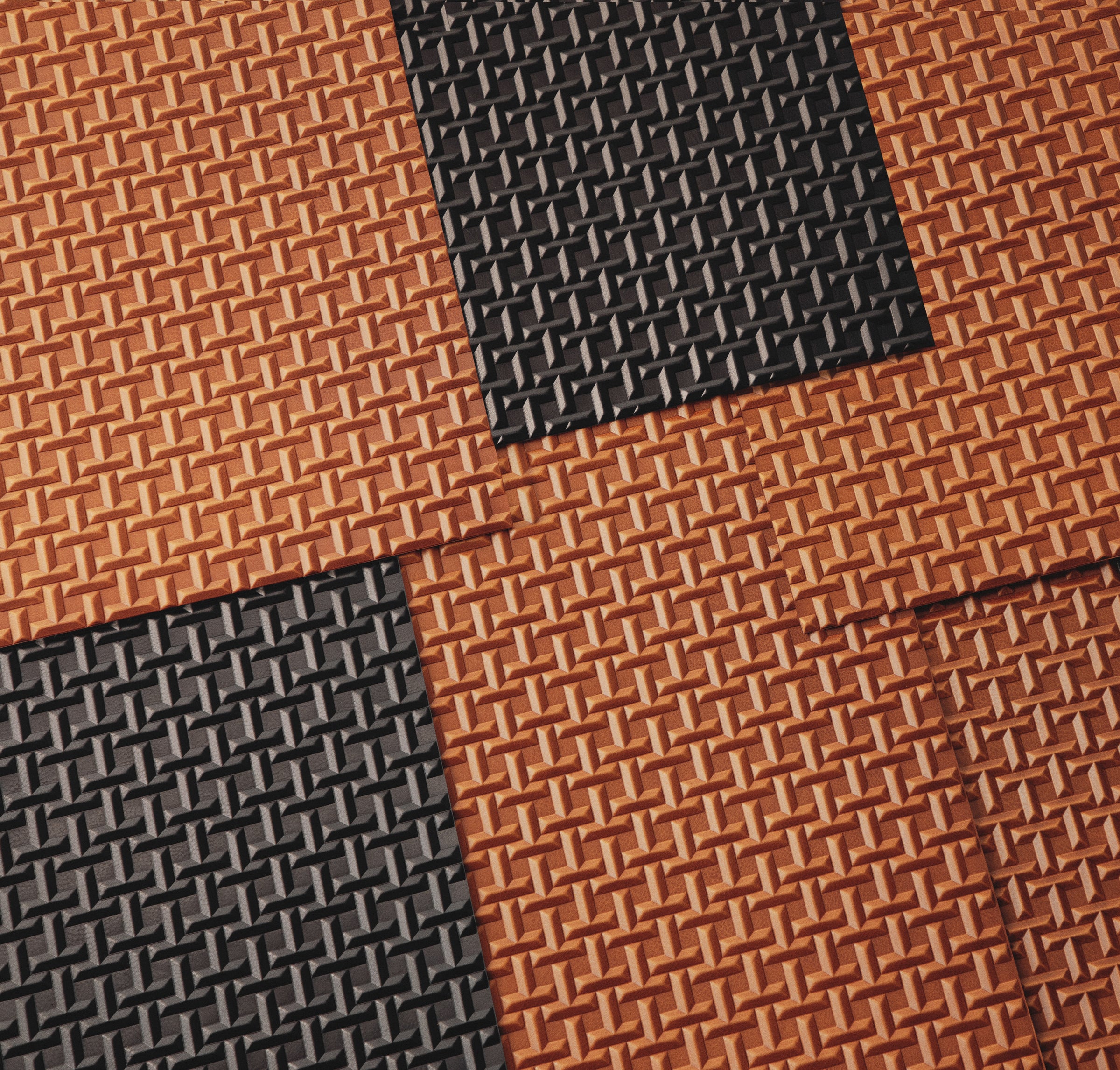 Image showing a spread of the brown and black TSUCHIYA Legacy Logo leather.