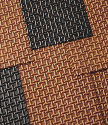 Image showing a spread of the brown and black TSUCHIYA Legacy Logo leather.